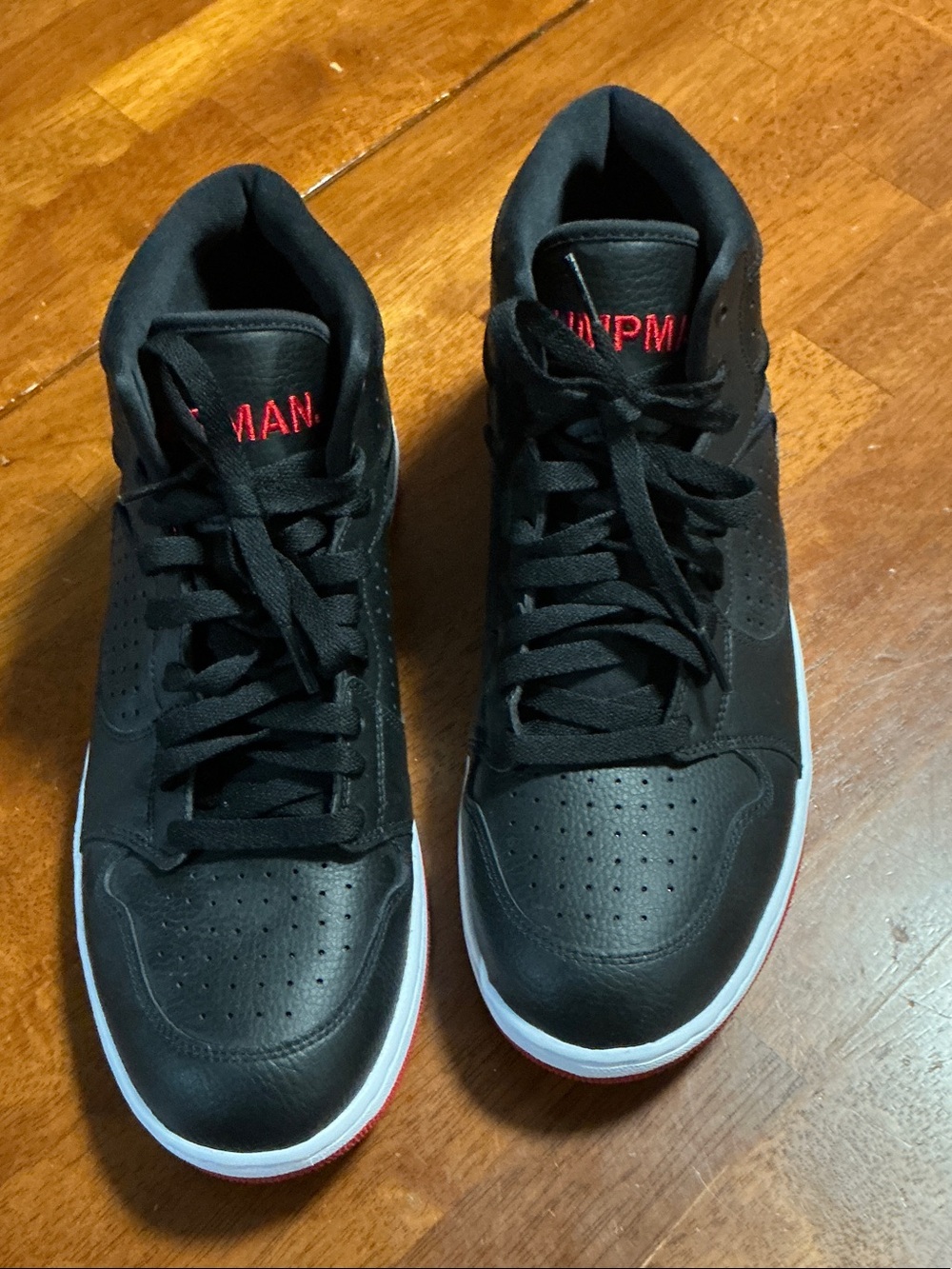 Nike Jordan Jumpman Sneakers with Red and White Trim